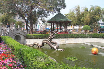 Public dragon sculpture spitting water at a park in Tainan, Taiwan