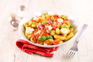 potato gnocchi with tomato sauce and mozzarella