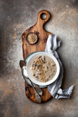 Obraz na płótnie Canvas Mushroom cream soup with garlic and thyme