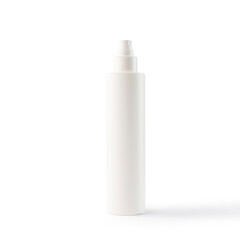Still life, close up on a cosmetic package resting on white background