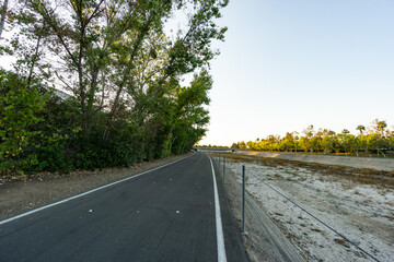 Empty jogging or cycling track at afternoon