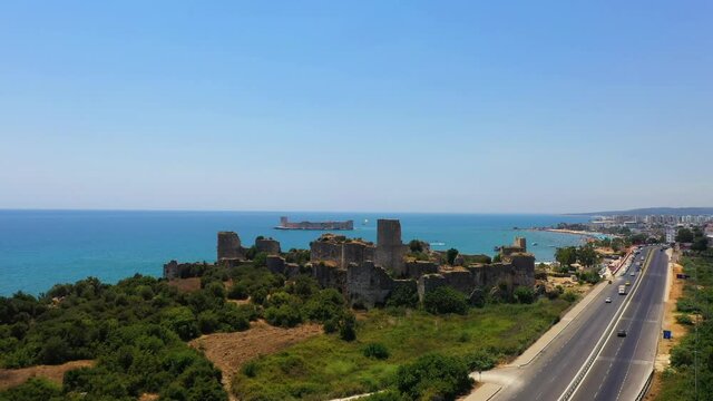 Kızkalesi is a town in Mersin Province, Turkey. The town, known in Antiquity as Corycus or Korykos, is named after the ancient castle built on a small island just facing the town.