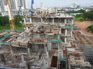 PENANG, MALAYSIA -JUNE 18, 2021: Structural works are underway at the construction site....