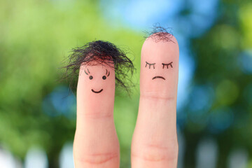 Fingers art of people. One woman is upset because she doesn't have much hair.