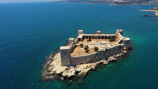 Kızkalesi is a town in Mersin Province, Turkey. The town, known in Antiquity as Corycus or Korykos, is named after the ancient castle built on a small island just facing the town.