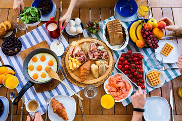 Laid table with food.breakfasts on the table top view.Large table with food top view. food and...