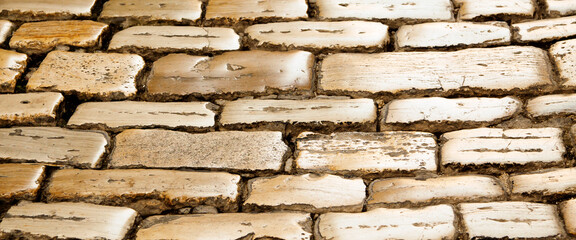 Web banner, background of old golden stone pathway