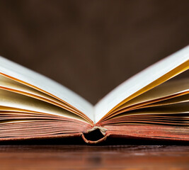 Story book, storytelling concept, vintage book on wooden background.
