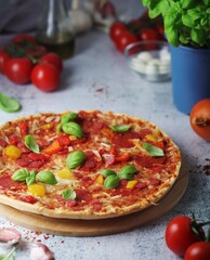 Pizza with salami and basil