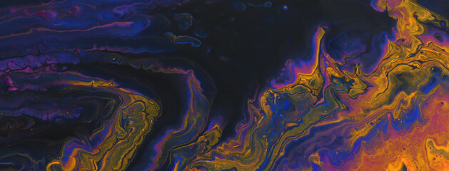 art photography of abstract marbleized effect background. Turquoise, purple, gold, yellow, blue and black creative colors. Beautiful paint