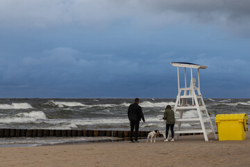 person walking on the beach