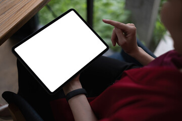 Naklejka premium business woman holding digital tablet. Blank screen for your advertising