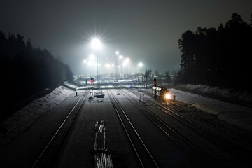 Sleeping trains in train depot at night