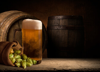 Hop twig over old wooden table background. Vintage style. Beer production ingredient. Brewery....