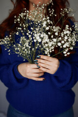 woman with flower gypsophila