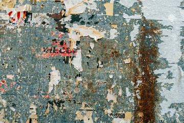 Old Urban Street Billboard With Torn Posters And Stickers