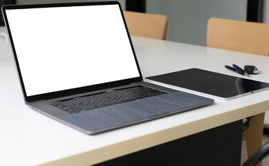 Fototapeta premium Laptop with blank screen on office desk.