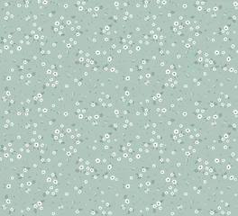 Wall murals Small flowers Cute floral pattern in the small flowers. Seamless vector texture. Elegant template for fashion prints. Printing with small white flowers. Pale blue gray  background.