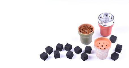 Hookah bowls with tobacco and charcoal for smoking on a white background. Space for text. Banner