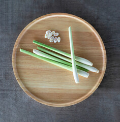 fresh lemongrass on a wooden tray