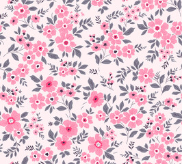Spring flowers print. Vector seamless floral pattern. Plant design for fashion prints. Endless print made of small coral and pink flowers. Elegant template. White background. Stock vector.