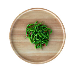 Red and Green hot chilli in a wooden tray on a white background