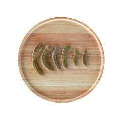 young tamarind in a wooden tray on a white background