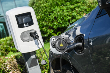 voiture auto électrique recharge borne batterie environnement - obrazy, fototapety, plakaty