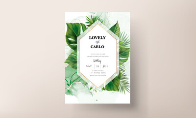 Elegant wedding invitation card with green tropical leaves watercolor