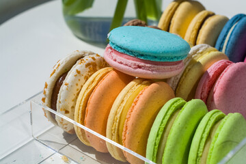 Colorful bright round desserts macaroon from the French confectionery and cafe.