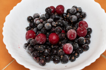 Frozen currants and cherries, close-up.