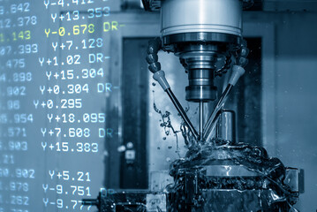 The abstract scene CNC milling machine cutting the shell mold parts and G-code data background. © Pixel_B