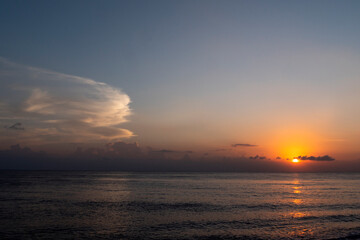 Amazing sunrise at the sea. Bali island, Indonesia.