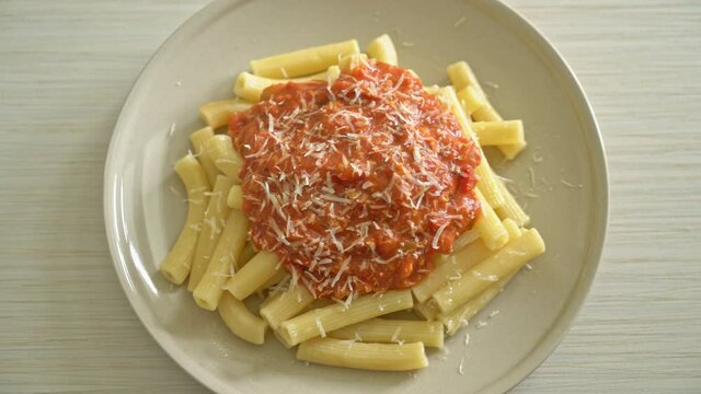 rigatoni pasta with pork bolognese sauce - Italian food style