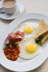 Plate of english breakfast set ready for breakfast