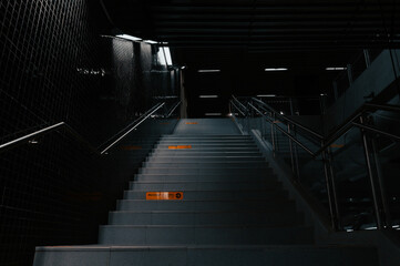 Urban subway stairs, centralized, wide and low angle shot.