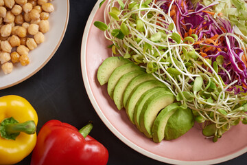 Vegetarian Buddha bowl with fresh vegetable salad and chickpea. Vegetarian and vegan food concept. Healthy eating.
