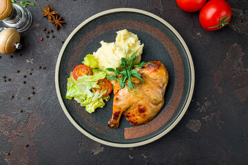 Chinese fried chicken with mashed potatoes top view on brown concrete table