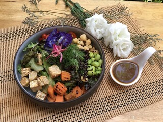 Mixed Salad with Tempeh include carrot, green bean, avocado radish, chic pea with soy sauce