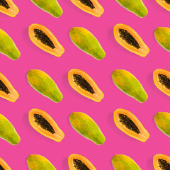 Fresh ripe papaya seamless pattern on pink background. Tropical abstract background. Top view. Creative design, minimal flat lay concept. Trend tropical fruit food background pattern