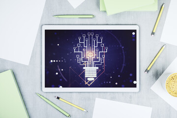 Creative idea concept with light bulb and microcircuit illustration on modern digital tablet screen. Neural networks and machine learning concept. Top view. 3D Rendering