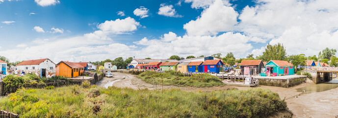 Colorful cabins on the port of the Château d'Oléron