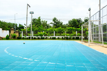 Football futsal ball goal and floor. Indoor soccer sports hall. Sport Futsal background. Indoor Soccer Winter League.