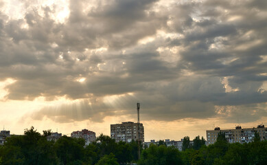 Fototapeta na wymiar dramatic clouds float over the city