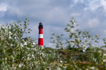 Leuchtturm Sylt Deutschland Nordsee Insel Sehensw&uuml;rdigkeit H&ouml;rnum Westerland Nationalpark Wattenmeer Welterbe Licht rot wei&szlig; D&uuml;nen Wahrzeichen K&uuml;ste Schifffahrt Navigation Orientierung Symbol