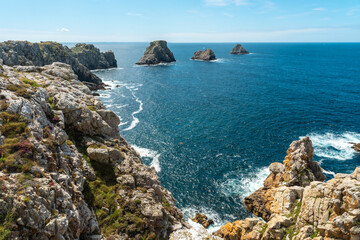 Fototapeta premium The beautiful coastline in summer at Pen Hir Point on the Crozon Peninsula in French Brittany, the three famous islets, France