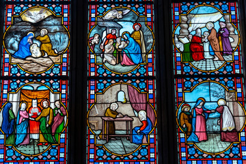 Stained glass inside the Saint Corentin cathedral in the medieval village of Quimper in the...
