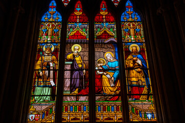 Stained glass inside the Saint Corentin cathedral in the medieval village of Quimper in the...