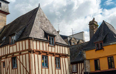 Old wooden colored houses in the medieval village of Quimper in the Finisterre department. French...