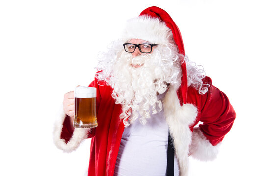 Funny Santa Claus drinks beer.